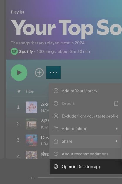 Opción Abrir en la aplicación de escritorio para abrir una lista de reproducción en la aplicación Spotify en una Mac